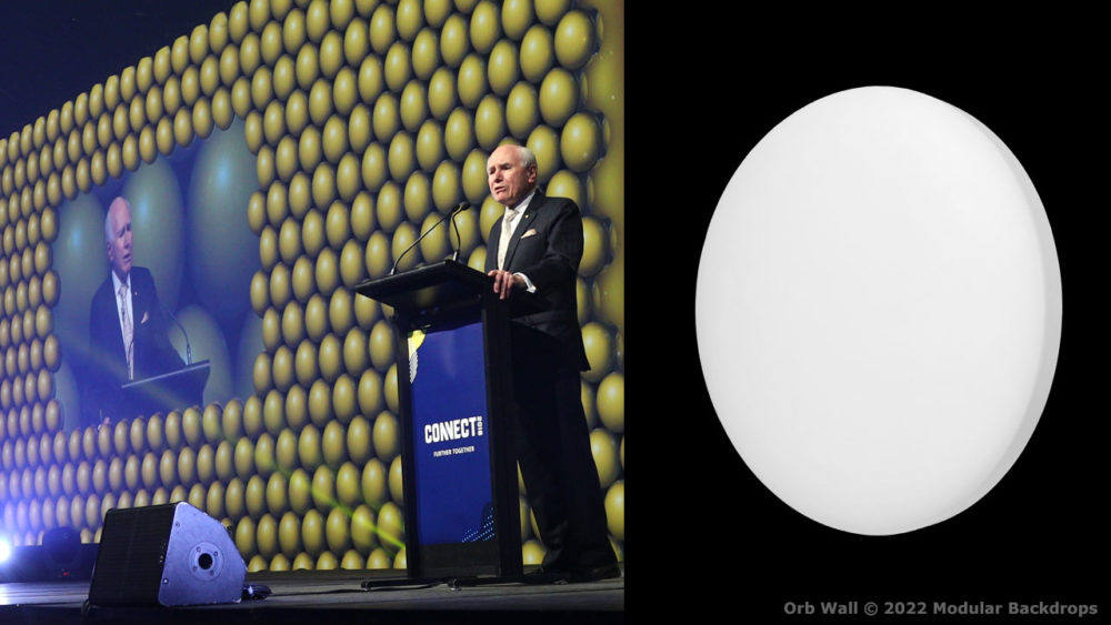Orb Wall Panel and John Howard in front of Orb Stage Set